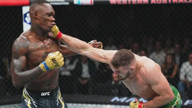 UFC fighter landing a powerful right cross in the octagon